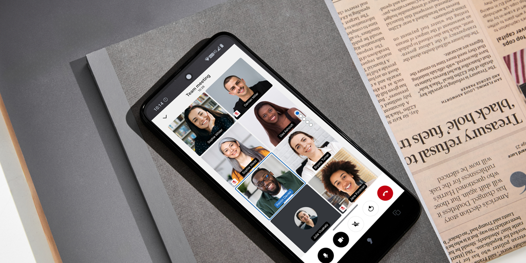 smartphone next to a newspaper with a end to end communication between different people